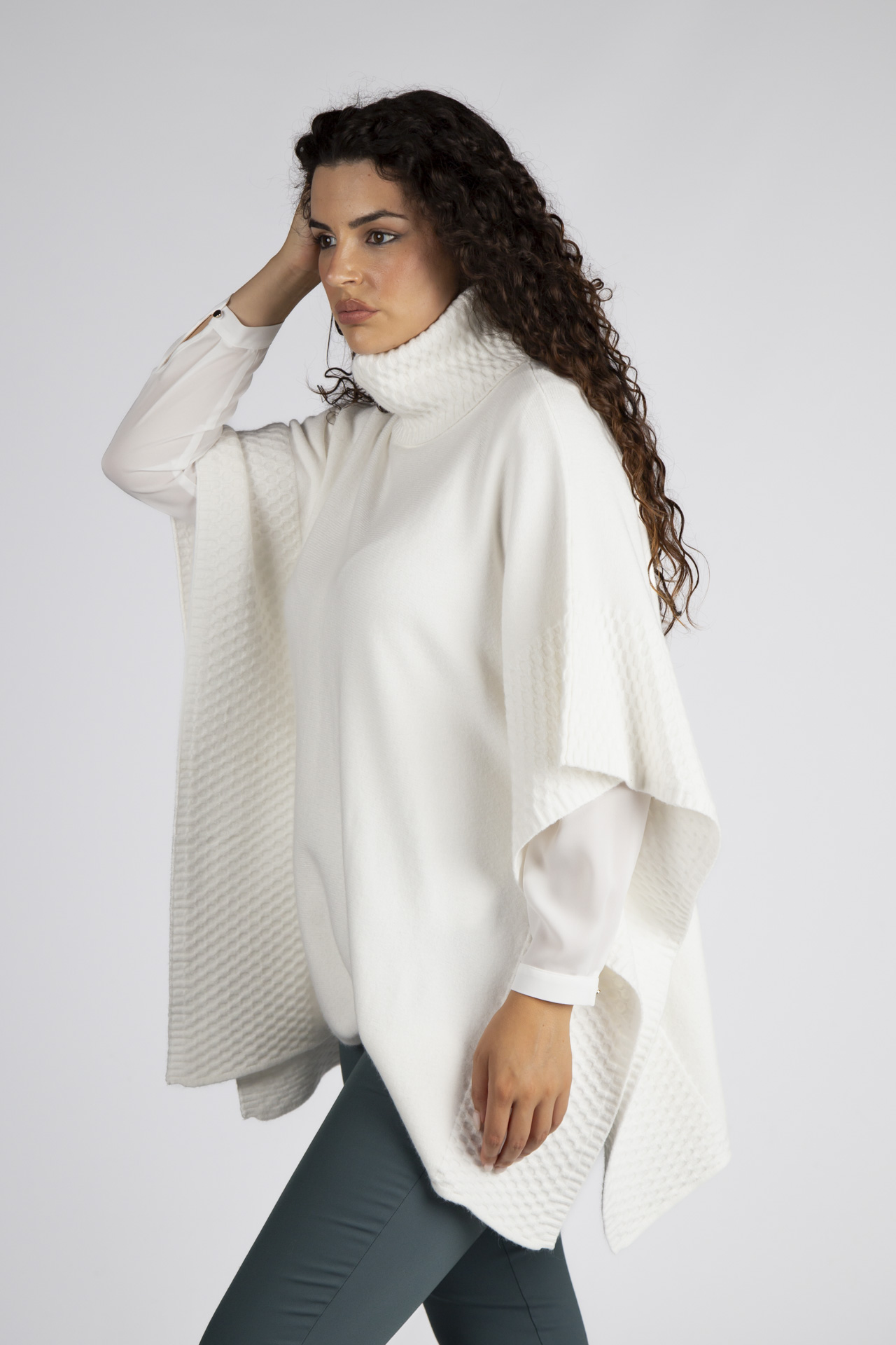Poncho-style knitted jumper