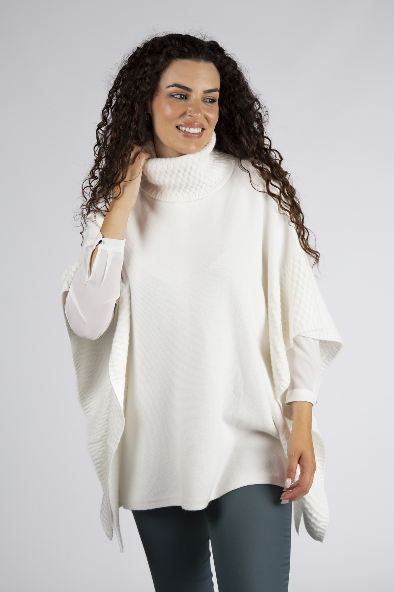 Poncho-style knitted jumper