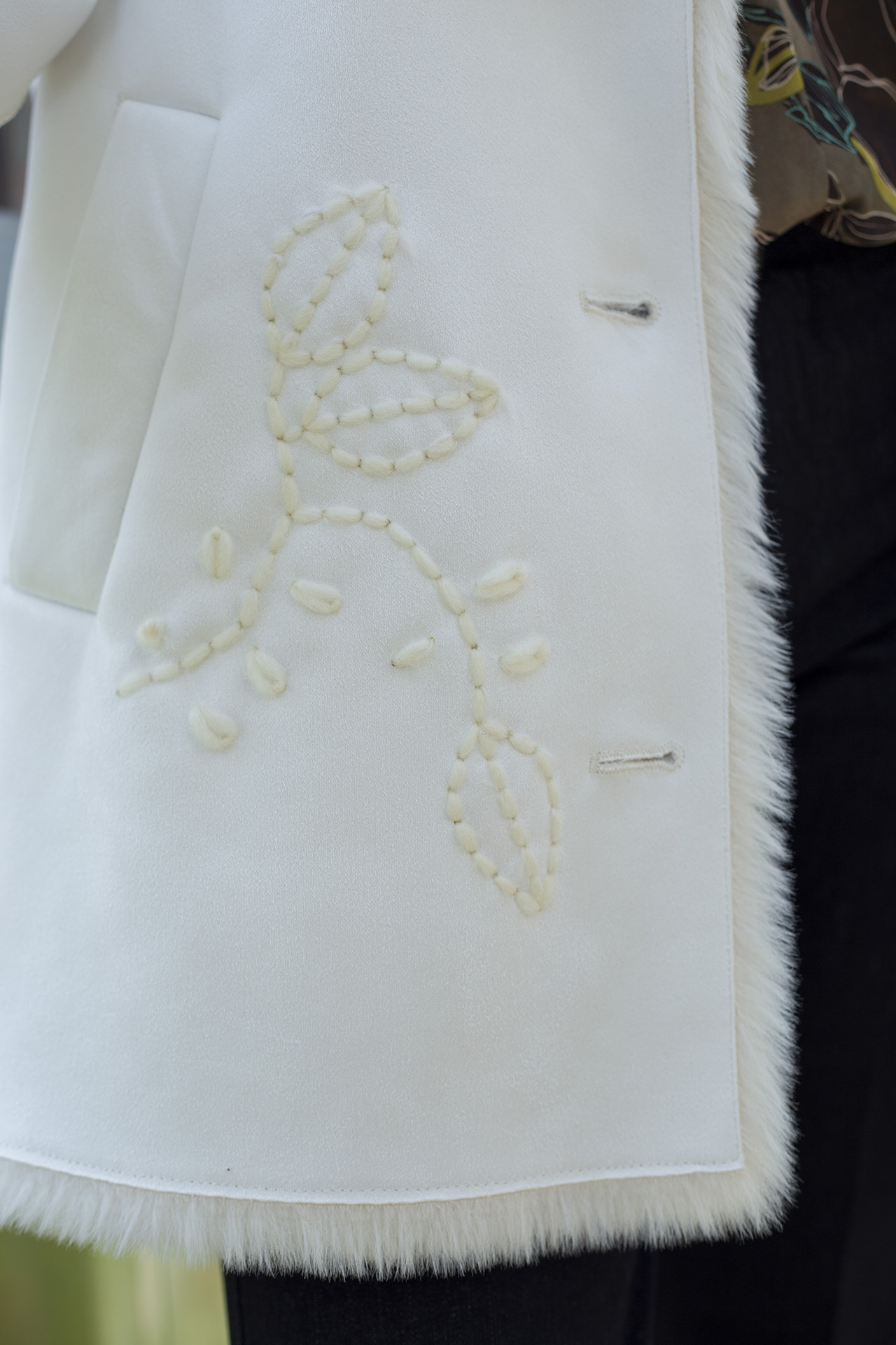 Fur coat with embroidery