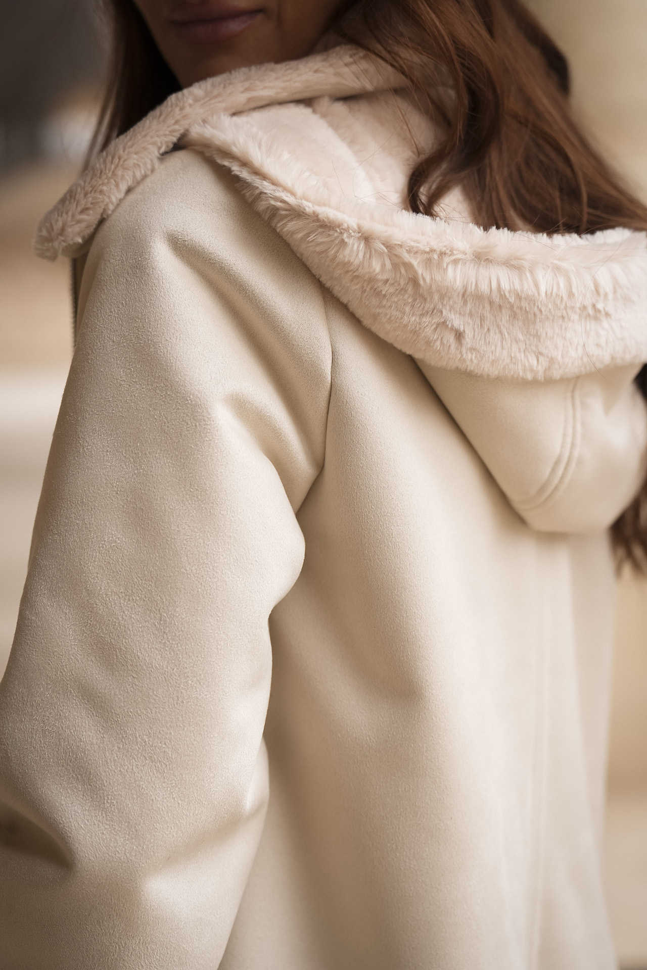 Coat with fur details