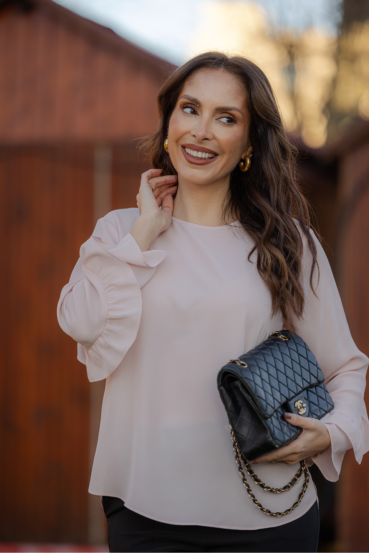 Blouse with ruffled sleeves