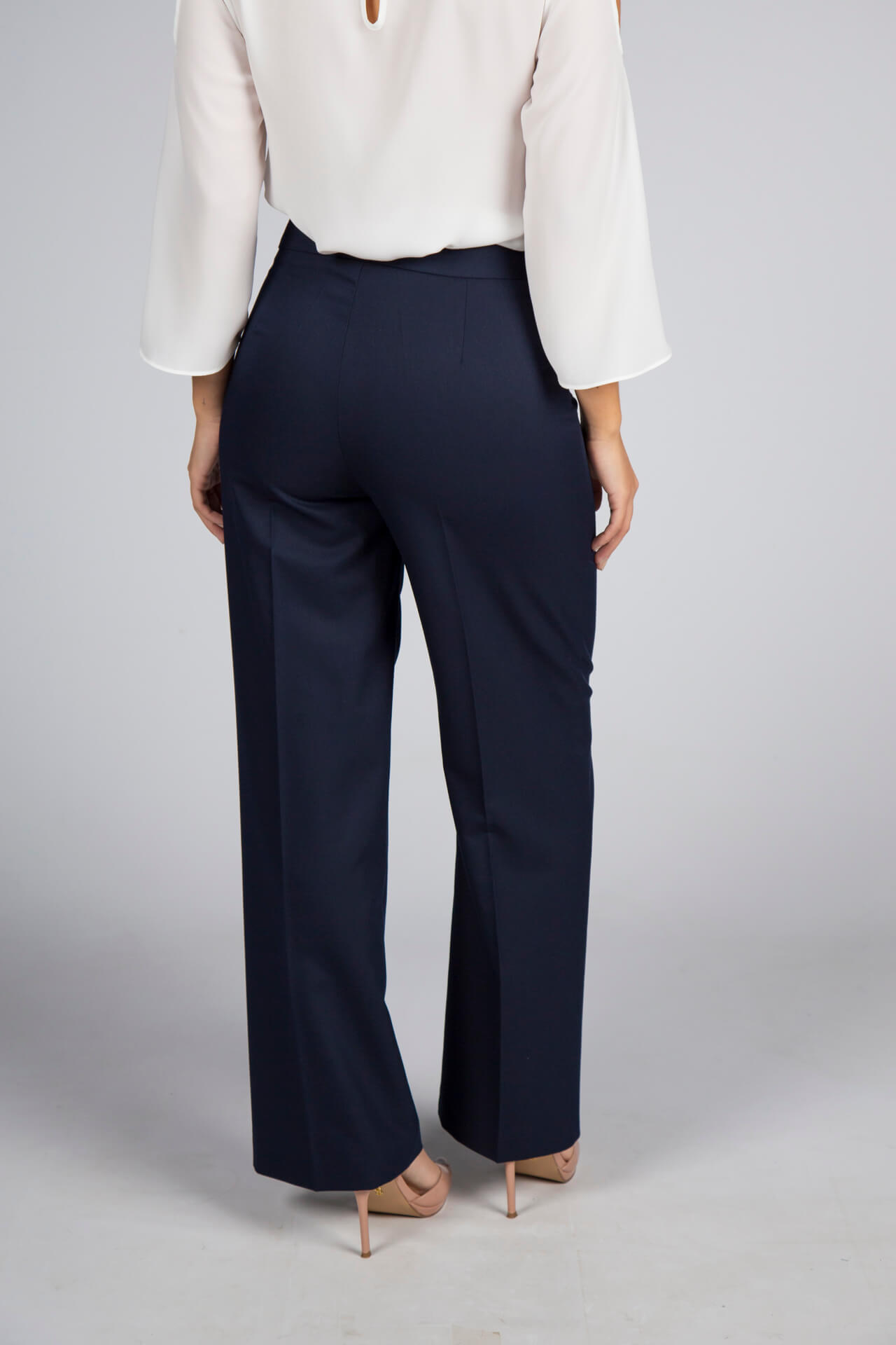 Trousers with double front flap
