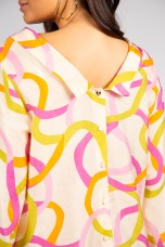 Blouse buttons at the back