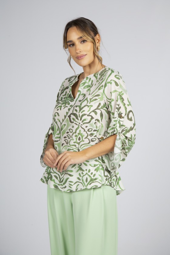 Túnica ilhós dourados