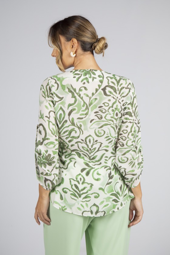 Túnica ilhós dourados