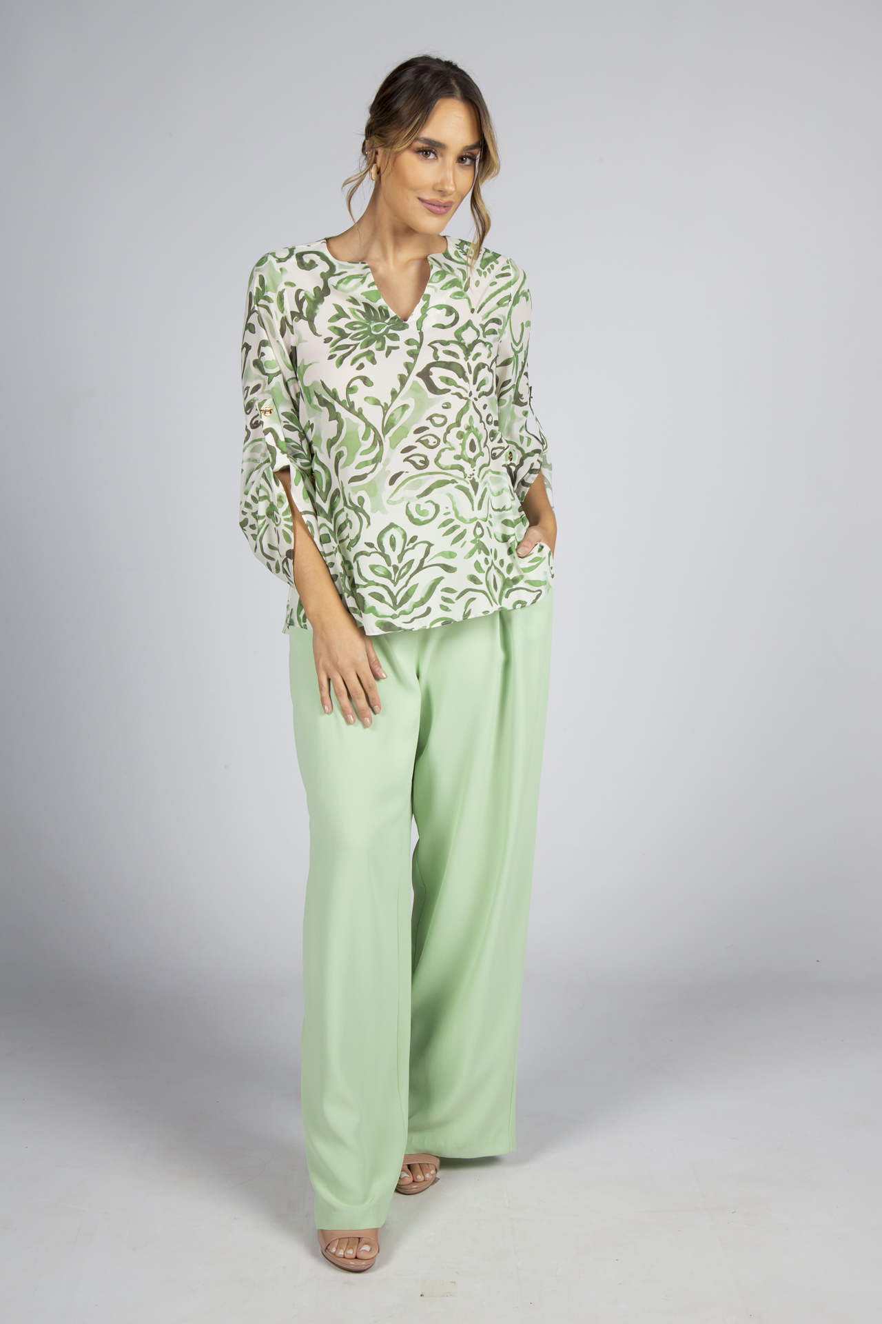 Túnica ilhós dourados