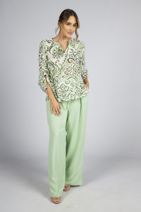 T�nica con ojales dorados