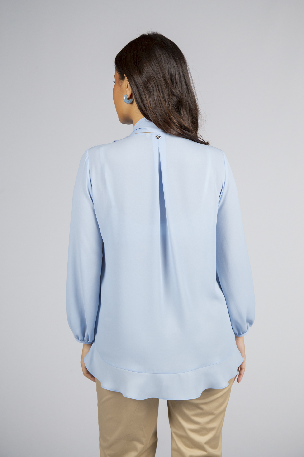 Túnica folhos e laçada