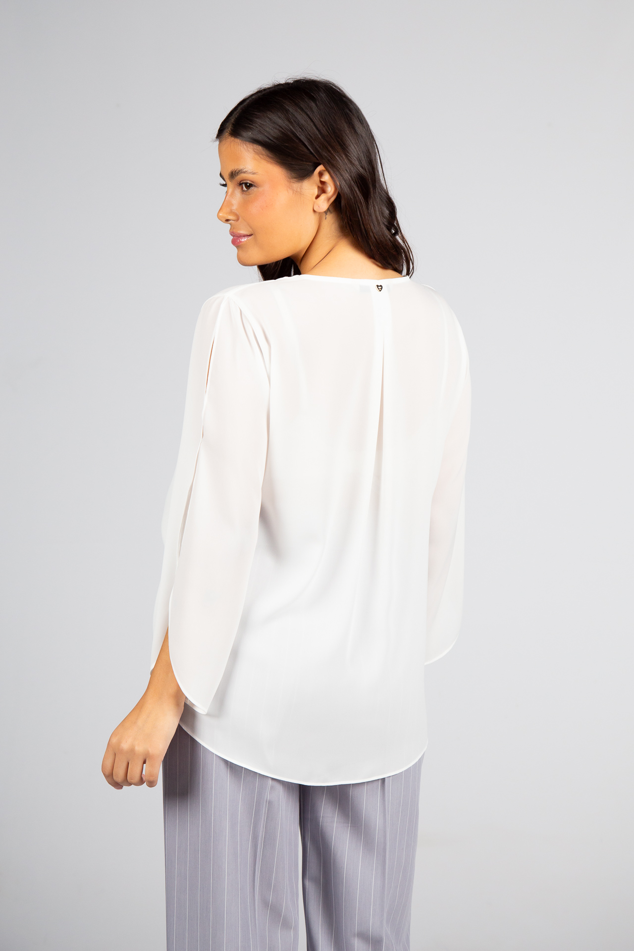Blouse with side bow