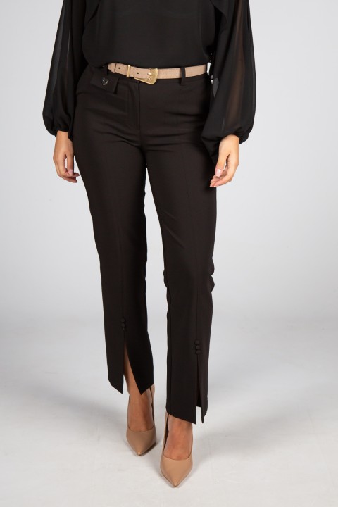 Trousers with opening at the bottom