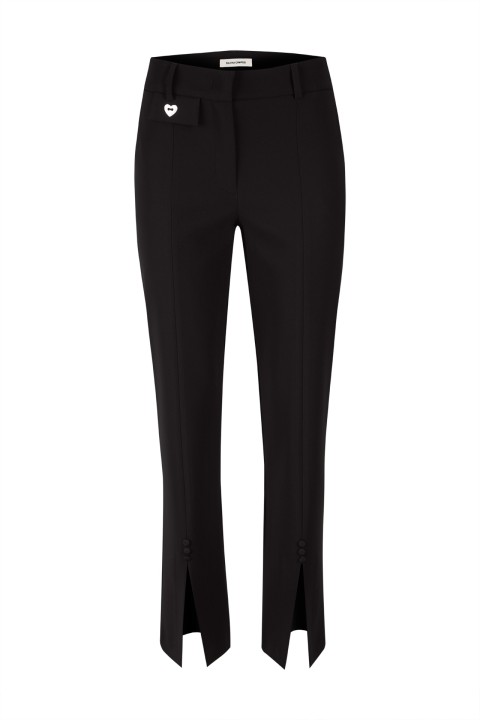 Trousers with opening at the bottom