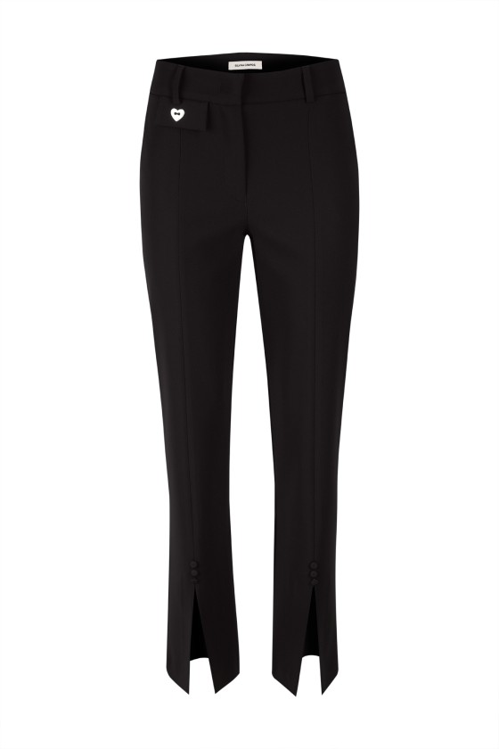 Trousers with opening at the bottom