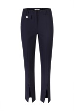 Trousers with opening at the bottom