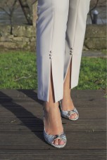 Trousers with opening at the bottom