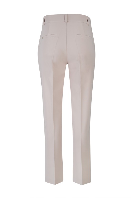 Trousers with opening at the bottom