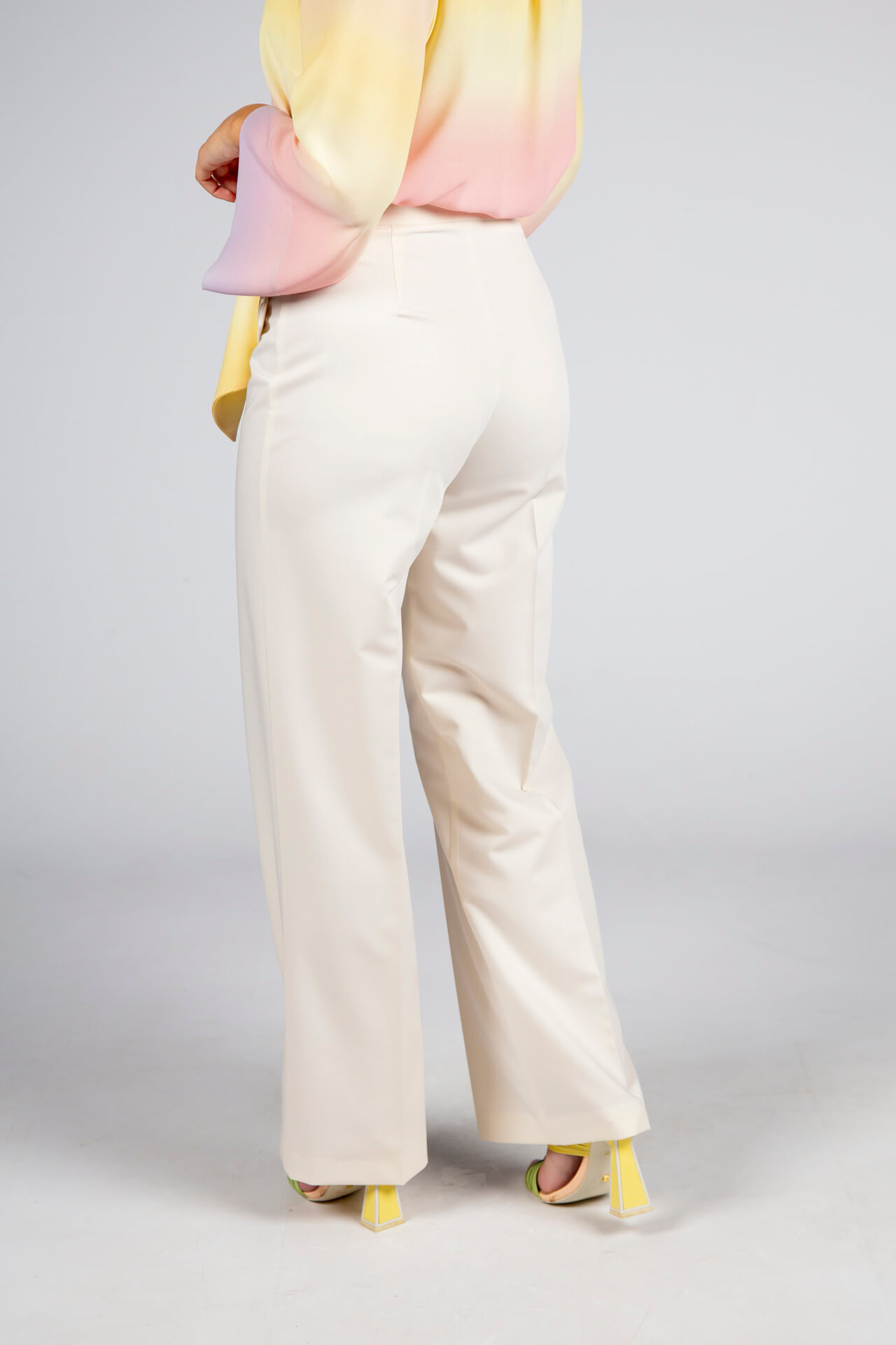 Trousers with double front flap