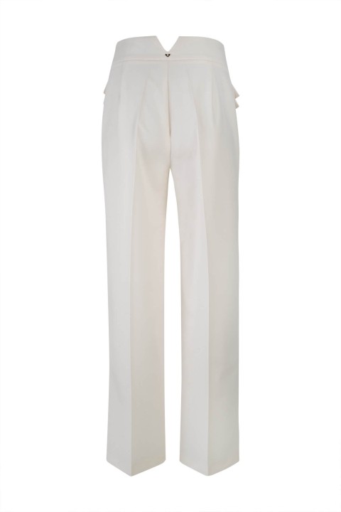 Trousers with double front flap