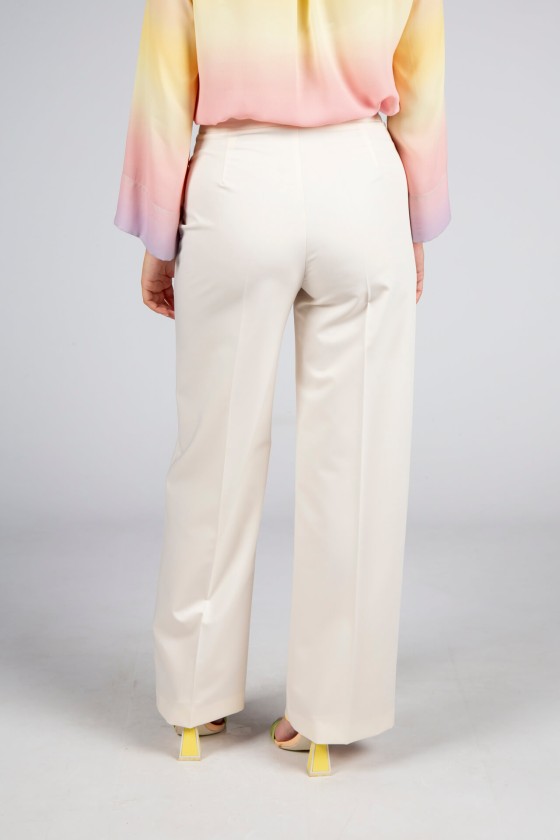 Trousers with double front flap
