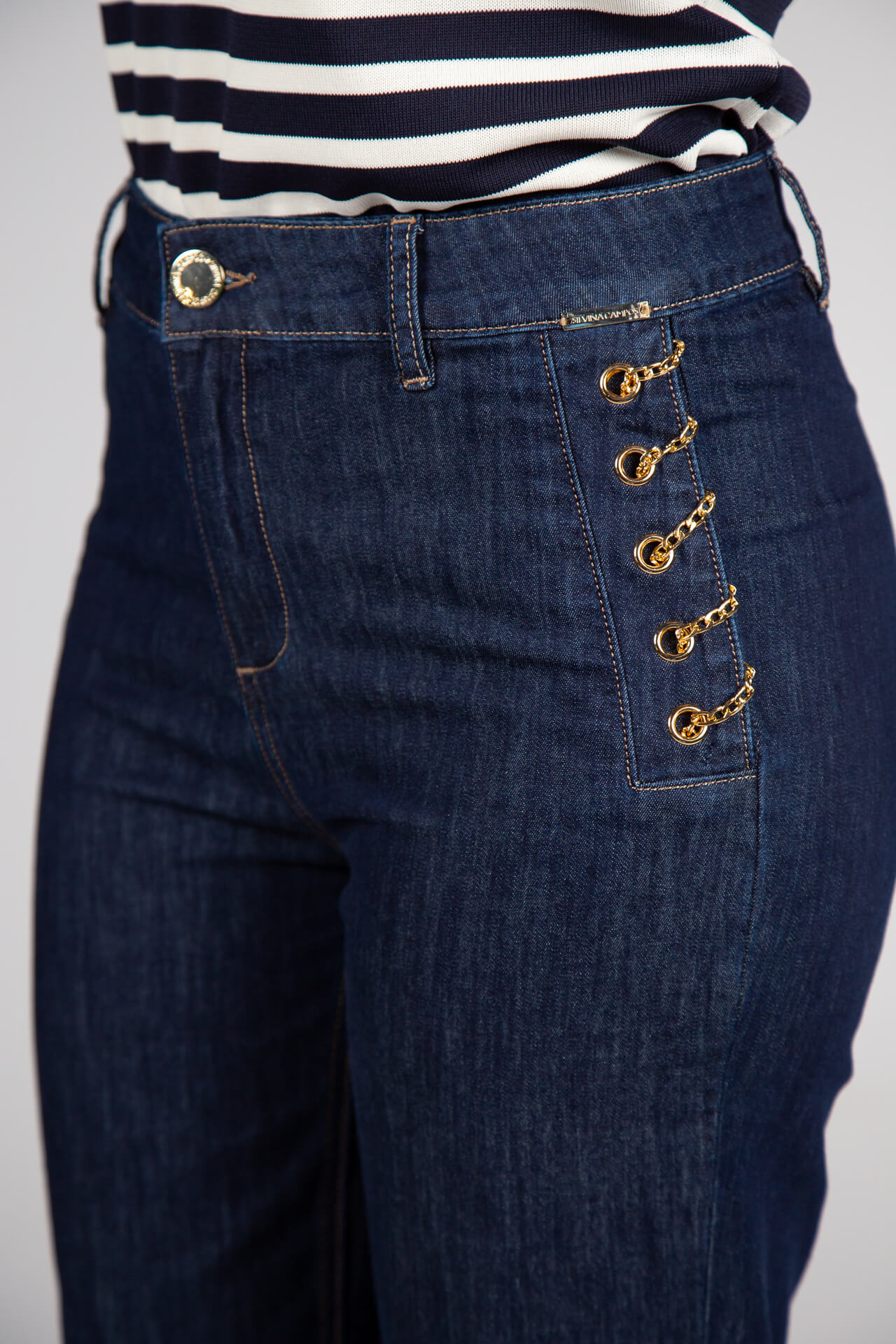 Denim trousers with gold chains