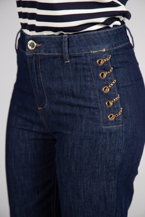 Denim trousers with gold chains Denim trousers with gold chains