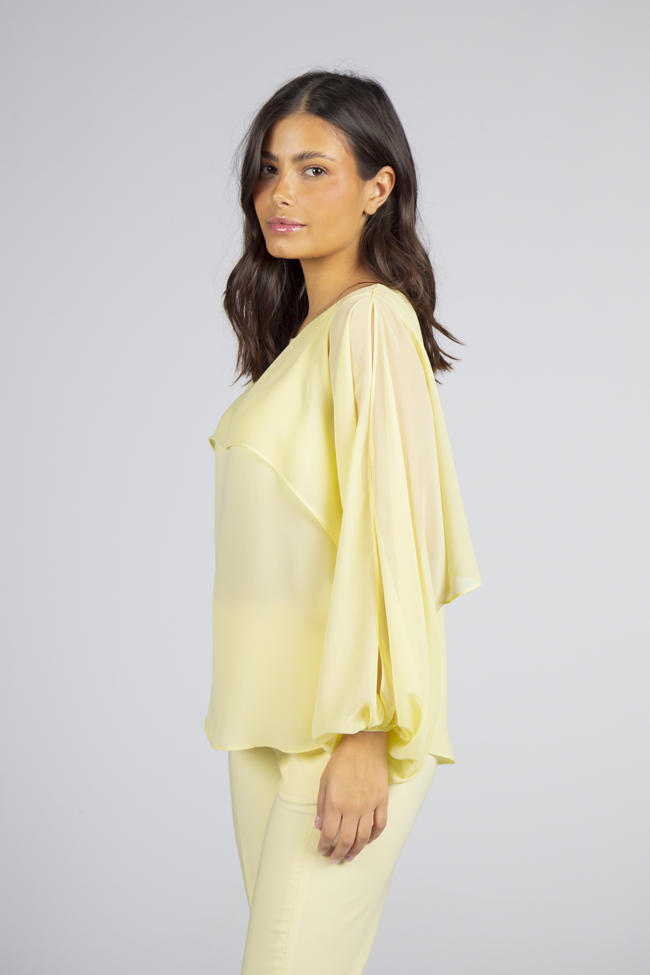 Blouse with cape-effect sleeves
