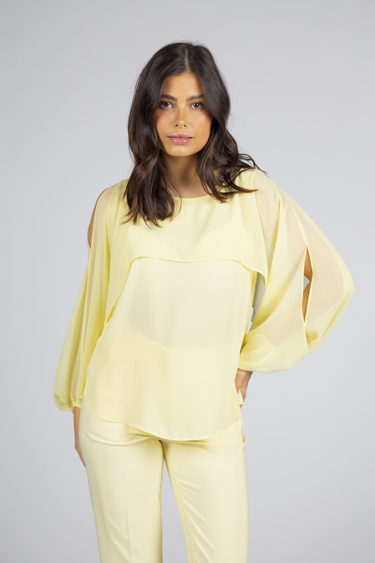 Blouse with cape-effect sleeves