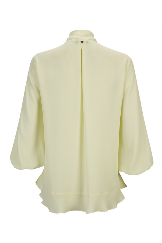 Blouse with ruffles and bow