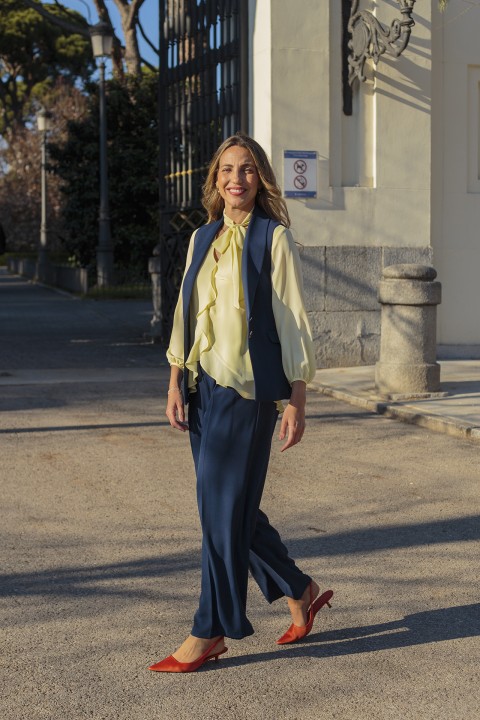 Blouse with ruffles and bow
