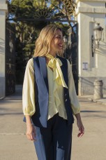Blouse with ruffles and bow