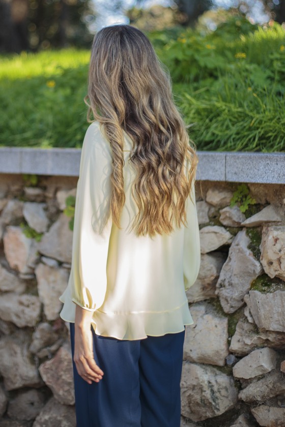 Blouse with ruffles and bow