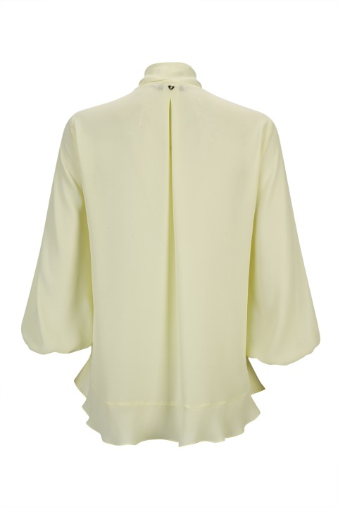 Blouse with ruffles and bow