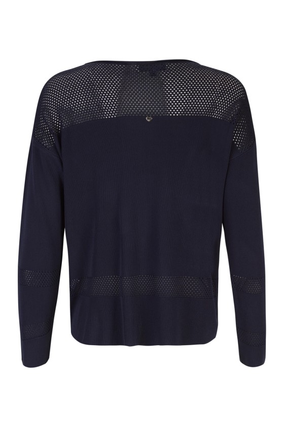 Knitted jumper with perforated areas