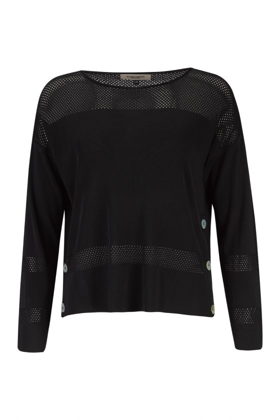 Knitted jumper with perforated areas