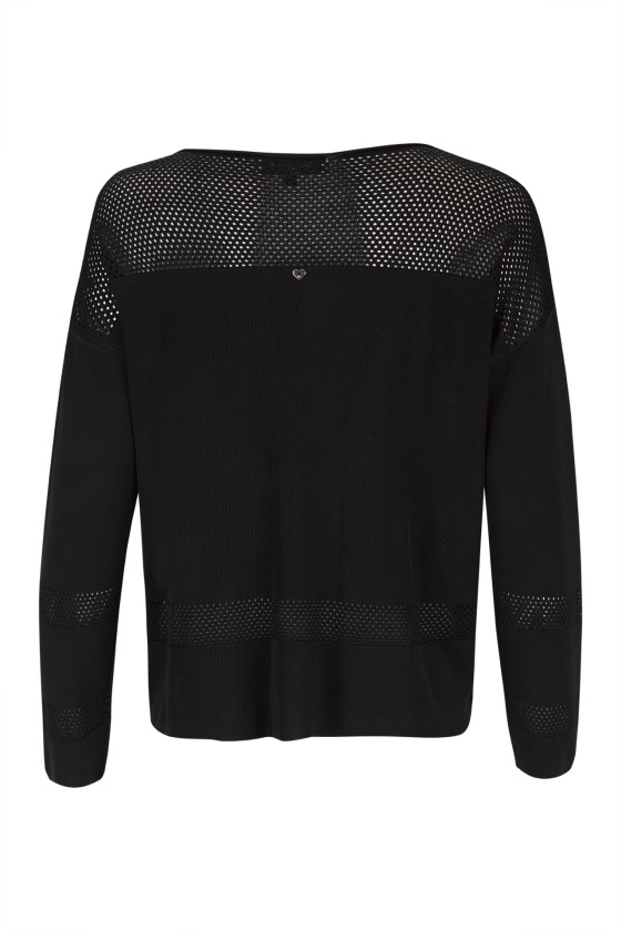 Knitted jumper with perforated areas