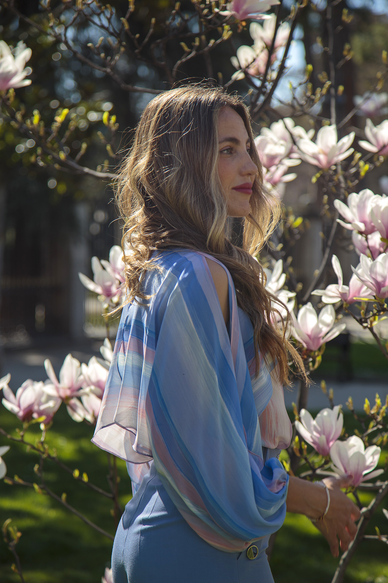 Blouse with cape-effect sleeves