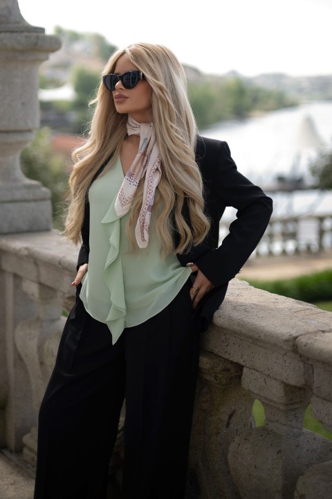 Blouse with bias-cut ruffle