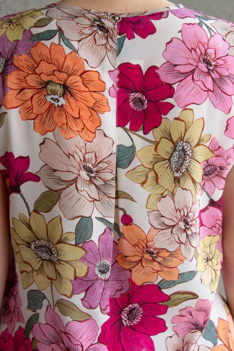 Blouse with bias-cut ruffle Blouse with bias-cut ruffle
