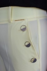 Trousers with silver buttons
