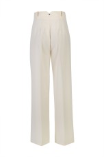 Trousers with silver buttons