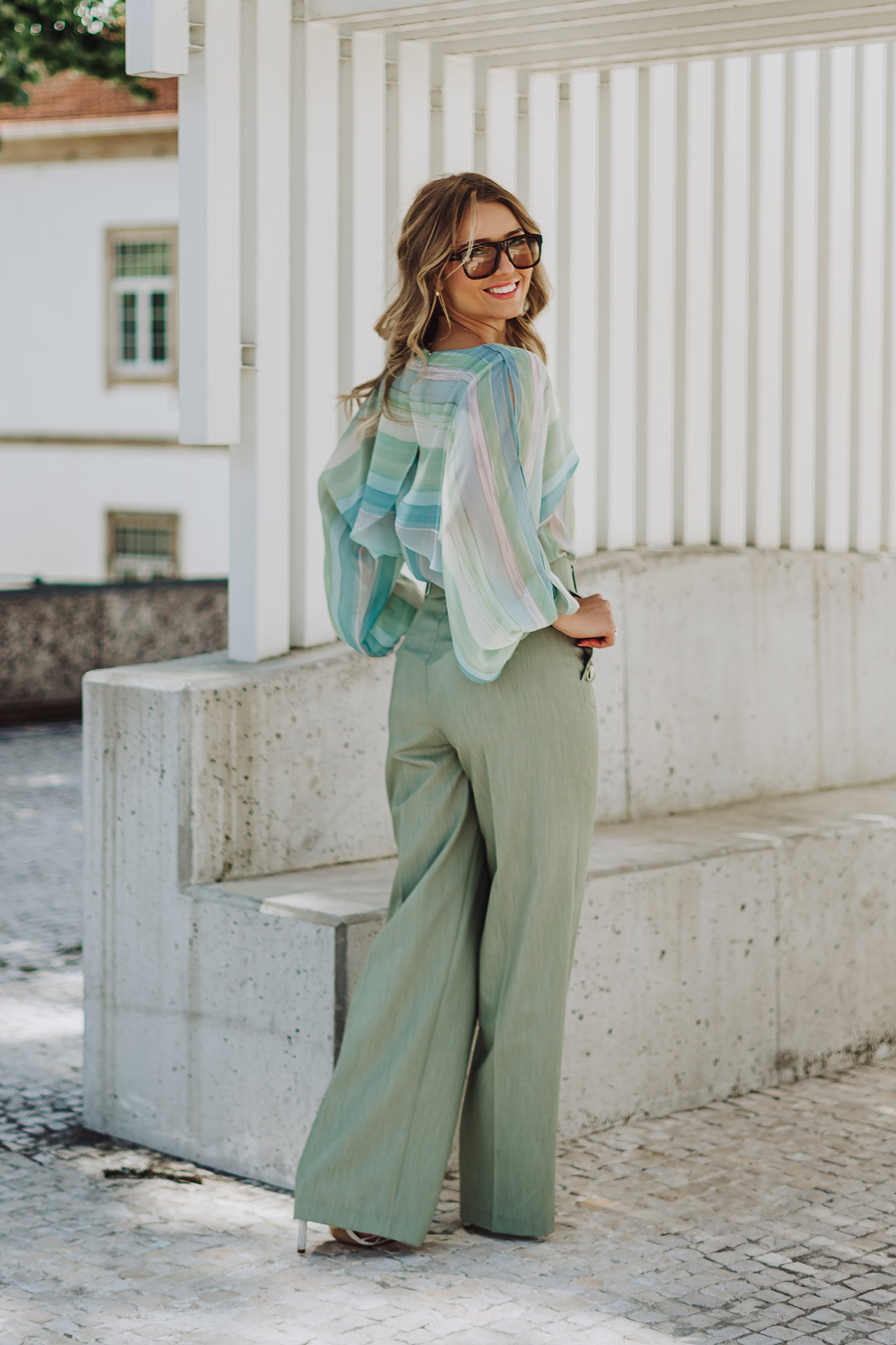 Blouse with cape-effect sleeves
