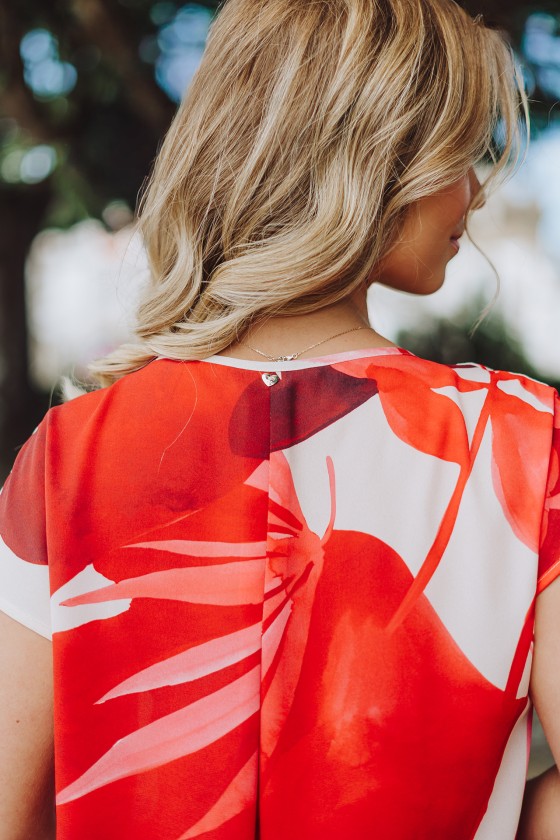 Blouse with bias-cut ruffle