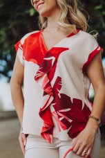 Blouse with bias-cut ruffle