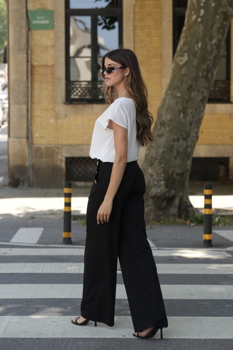 Trousers with silver buttons