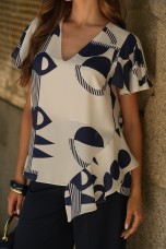 Blouse with an asymmetrical detail