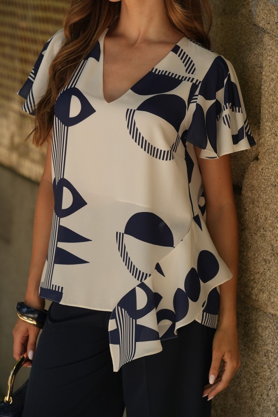 Blouse with an asymmetrical detail