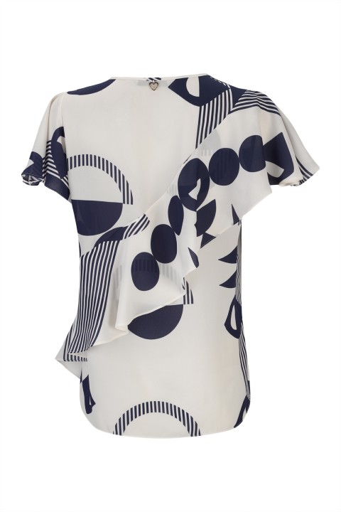Blouse with an asymmetrical detail Blouse with an asymmetrical detail