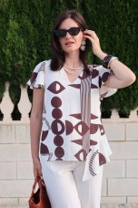 Blouse with an asymmetrical detail