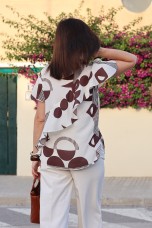 Blouse with an asymmetrical detail