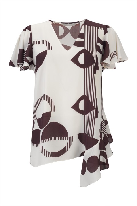 Blouse with an asymmetrical detail Blouse with an asymmetrical detail