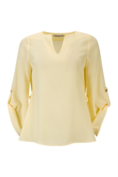 Blouse with gold eyelets Blouse with gold eyelets